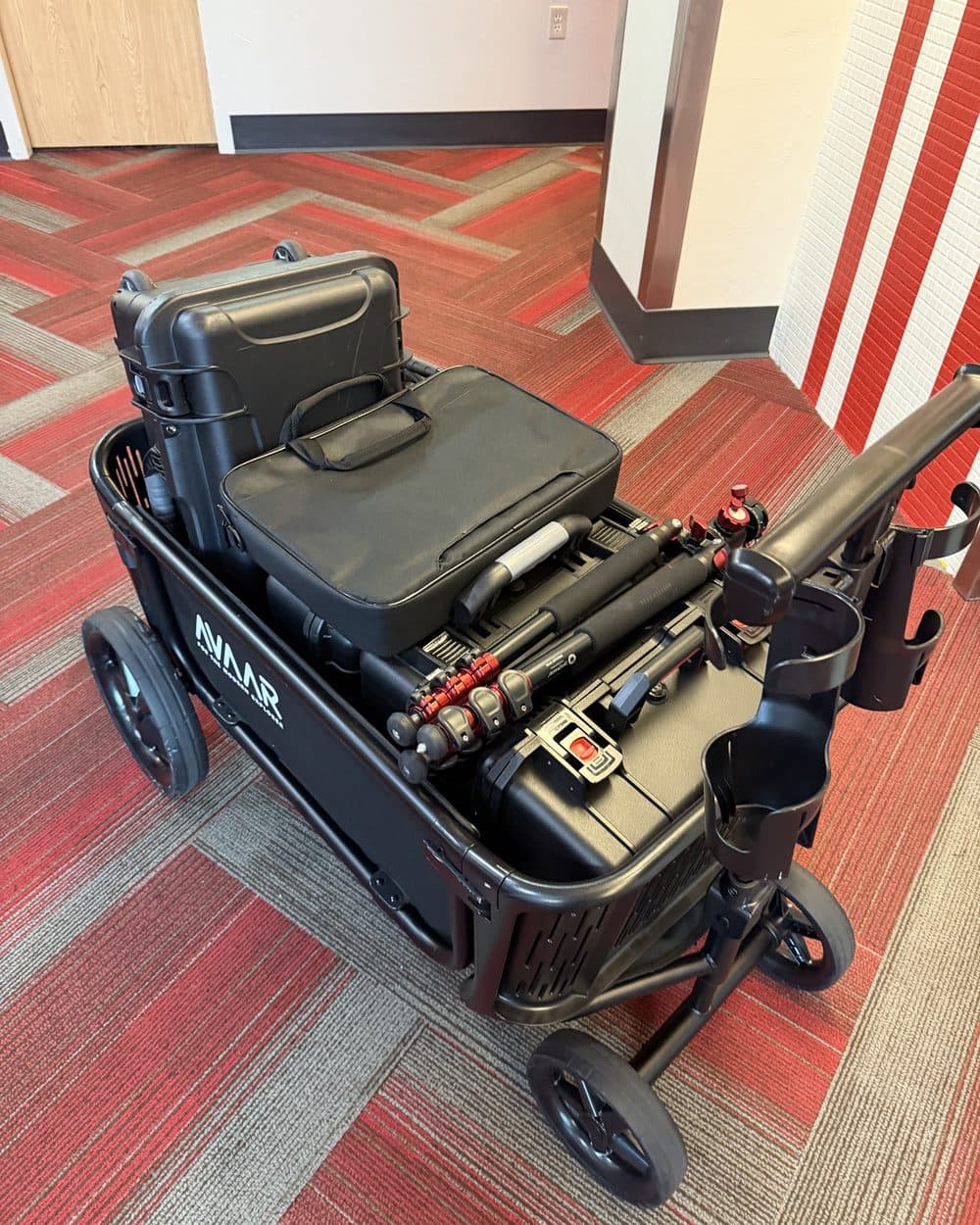 Cart loaded with camera and lighting gear
